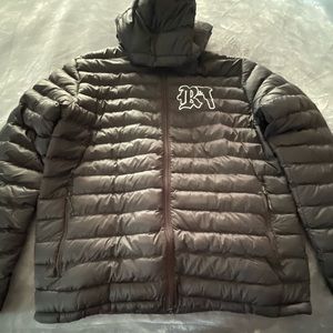 Black Risk Taker puffer jacket size medium and with white lettering
